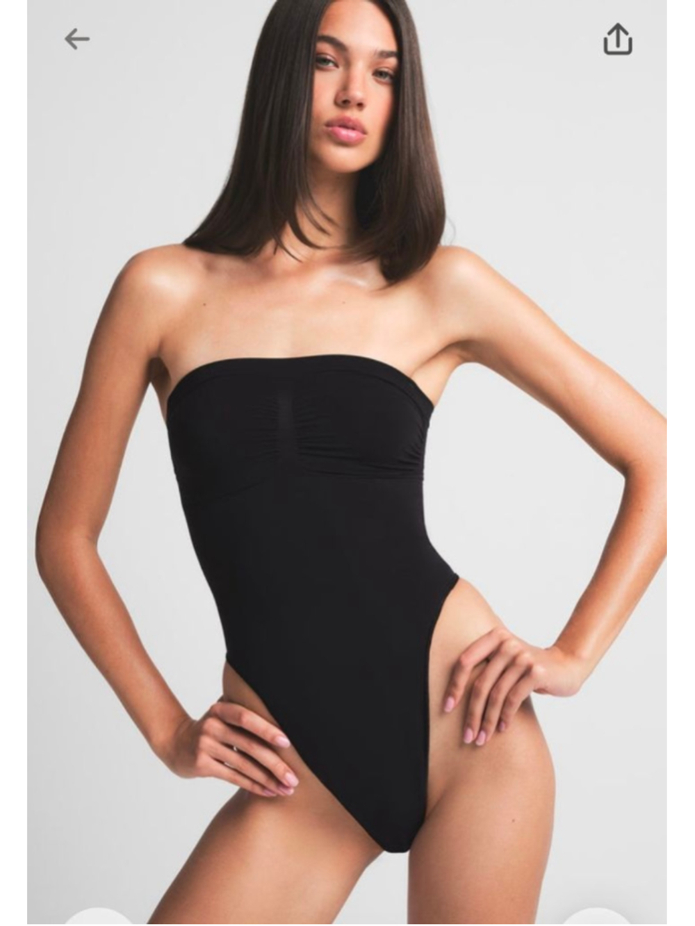 SKIMS Strapless High-Cut Shapewear Bodysuit in Black